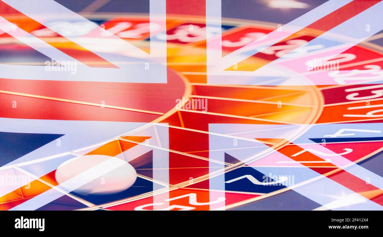 Roulette de casino surmontée avec le Royaume-Uni, drapeau de l'Union Jack. Jeu, dépendance de jeu concept. Banque D'Images