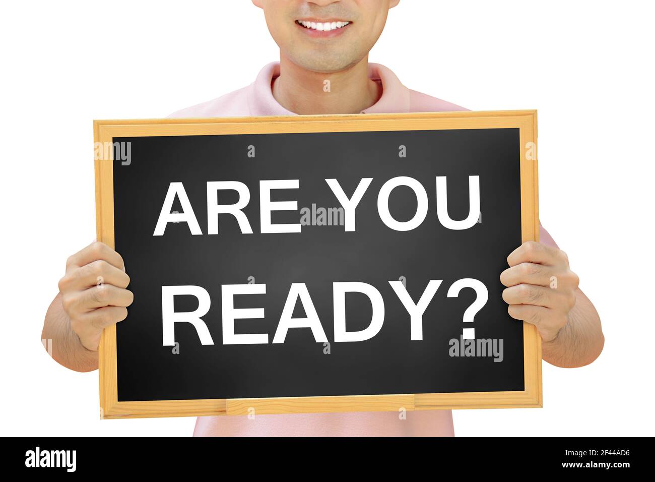 ÊTES-VOUS PRÊT texte sur le tableau noir tenu par homme souriant Banque D'Images