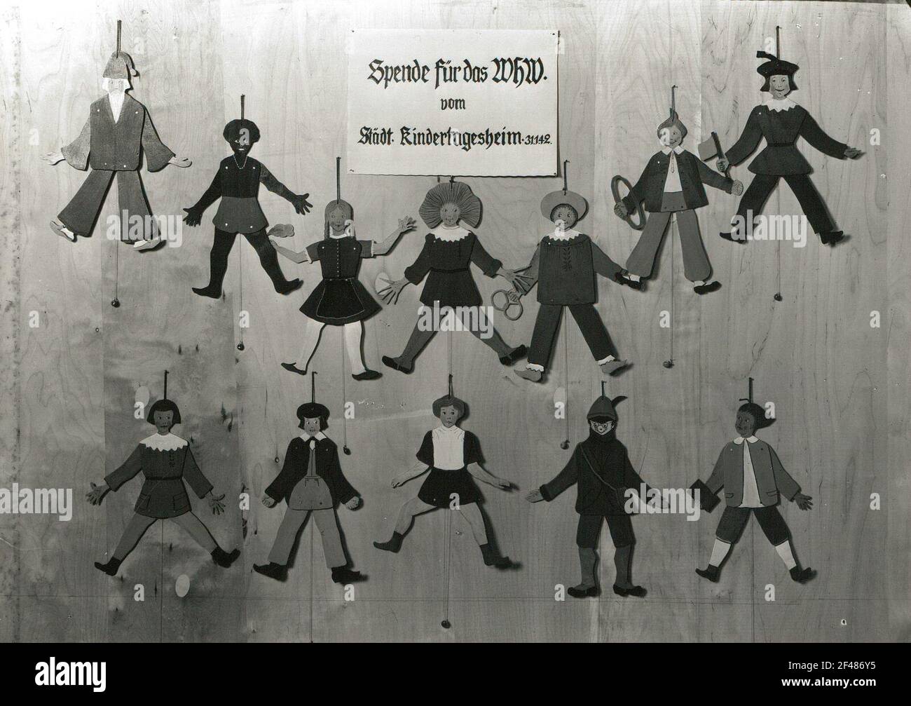 Hampelmen pour les figures de la 'truwelpeter' de H. Hoffmann (don pour l'assistant d'hiver de la journée des enfants) à Roßwein. Bois, scié, peint. 1941/1942 Banque D'Images