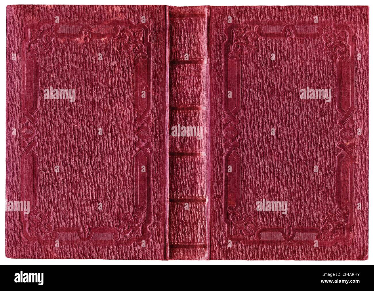 Ancienne couverture ouverte de livre en toile rouge rouge rouge cramoisi et texturée avec décorations abstraites en relief (vers 1848) isolée sur blanc - parfait dans le détail! Banque D'Images