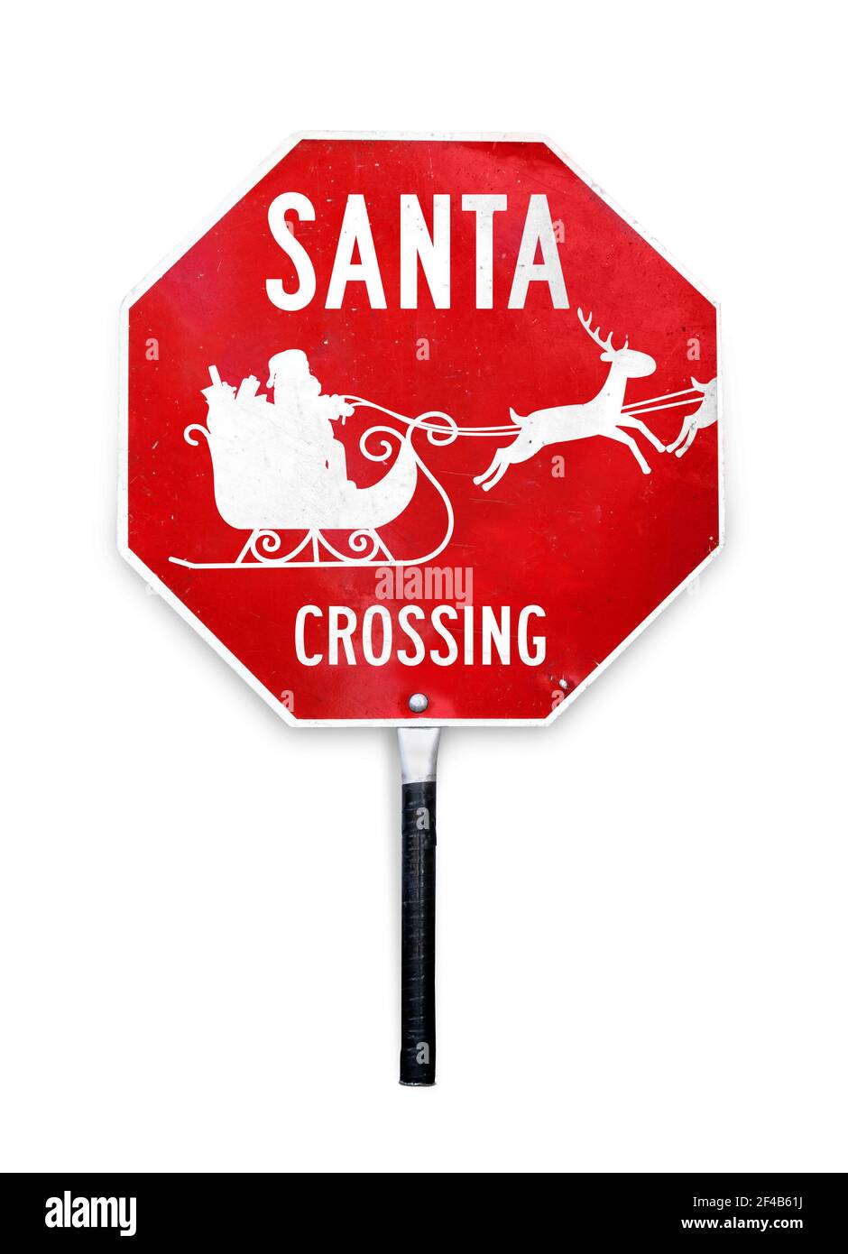 Panneau de Santa Crossing avec traîneau et renne. Panneau d'arrêt à thème de Noël à main utilisé pour le contrôle de la circulation en traversant les gardes. Banque D'Images