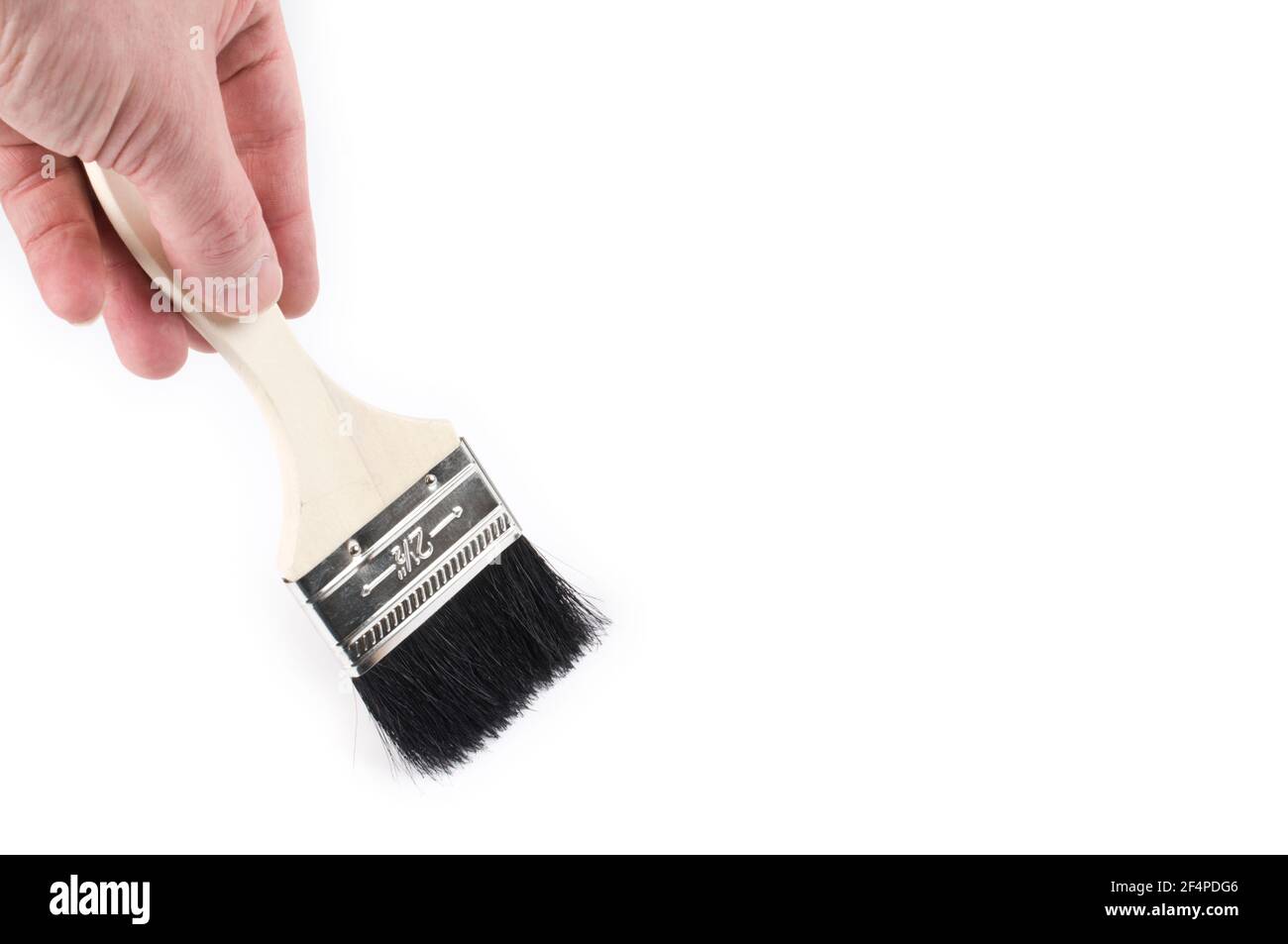 Peindre avec un pinceau. Isolé sur fond blanc. Banque D'Images