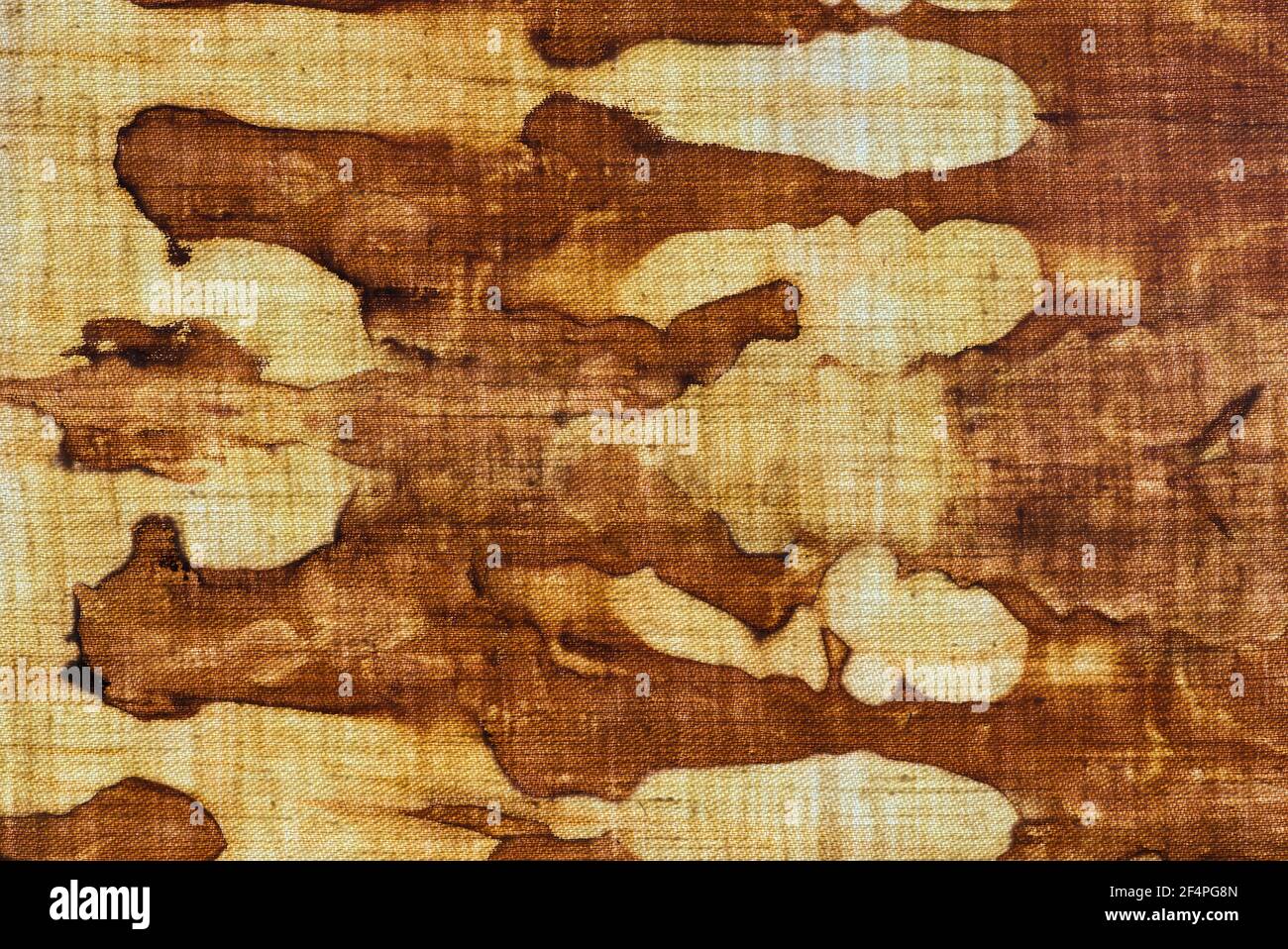 détail d'un motif en batik brun-ocre sur un coton tissu Banque D'Images