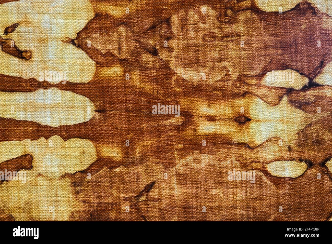 détail d'un motif en batik brun-ocre sur un coton tissu Banque D'Images