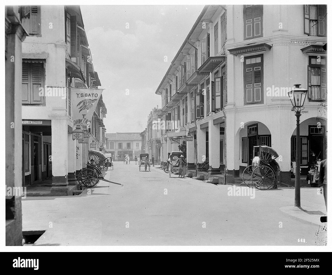 Rue à Singapour avec des restaurants, dans les rickshaws et attendre les invités Banque D'Images