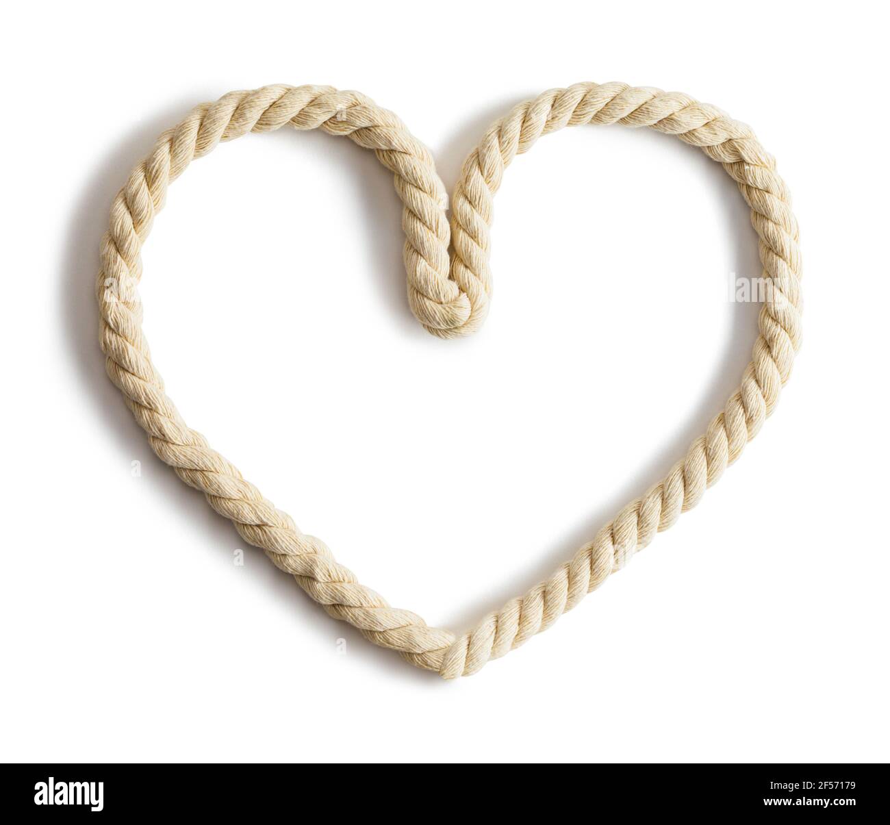 Corde de chanvre torsadée en forme de coeur découpe du cadre. Banque D'Images