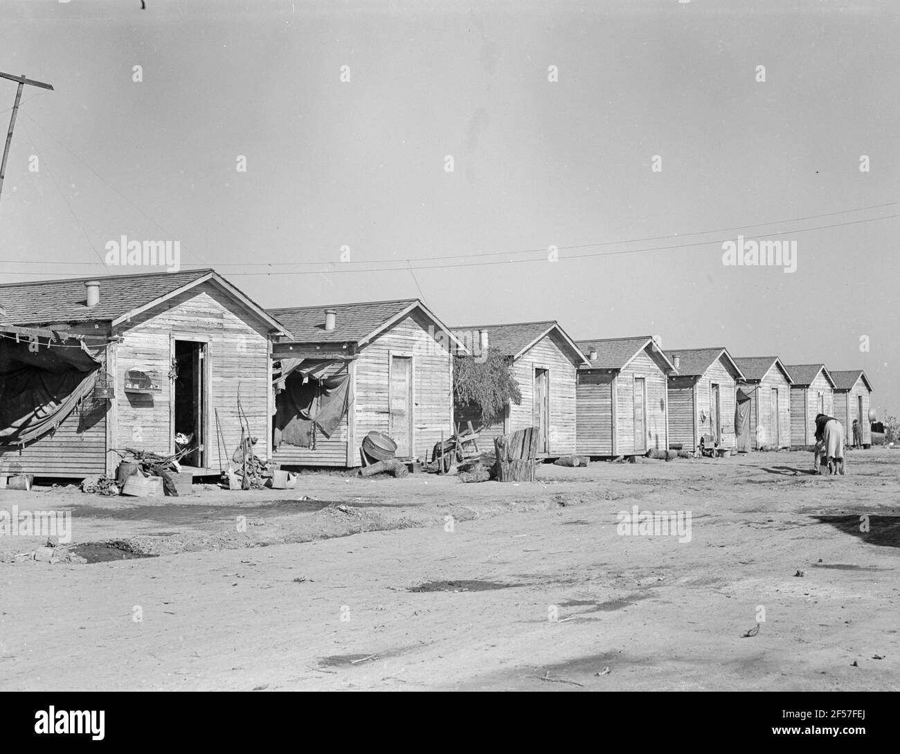 Entreprise de logement pour les travailleurs du coton près de Corcoran, Californie. Novembre 1936. Photo de Dorothea Lange. Banque D'Images