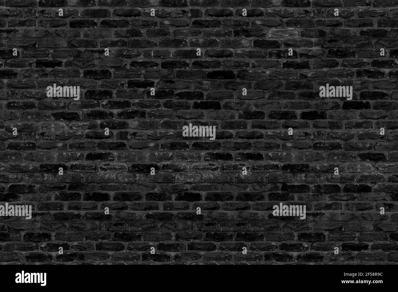 Texture sans couture brique noire. Nettoyage de la mosaïque pour le motif d'arrière-plan. Mosaïque rectangulaire carreaux mur haute résolution. Vieux ou artificiellement vieillis en production Banque D'Images