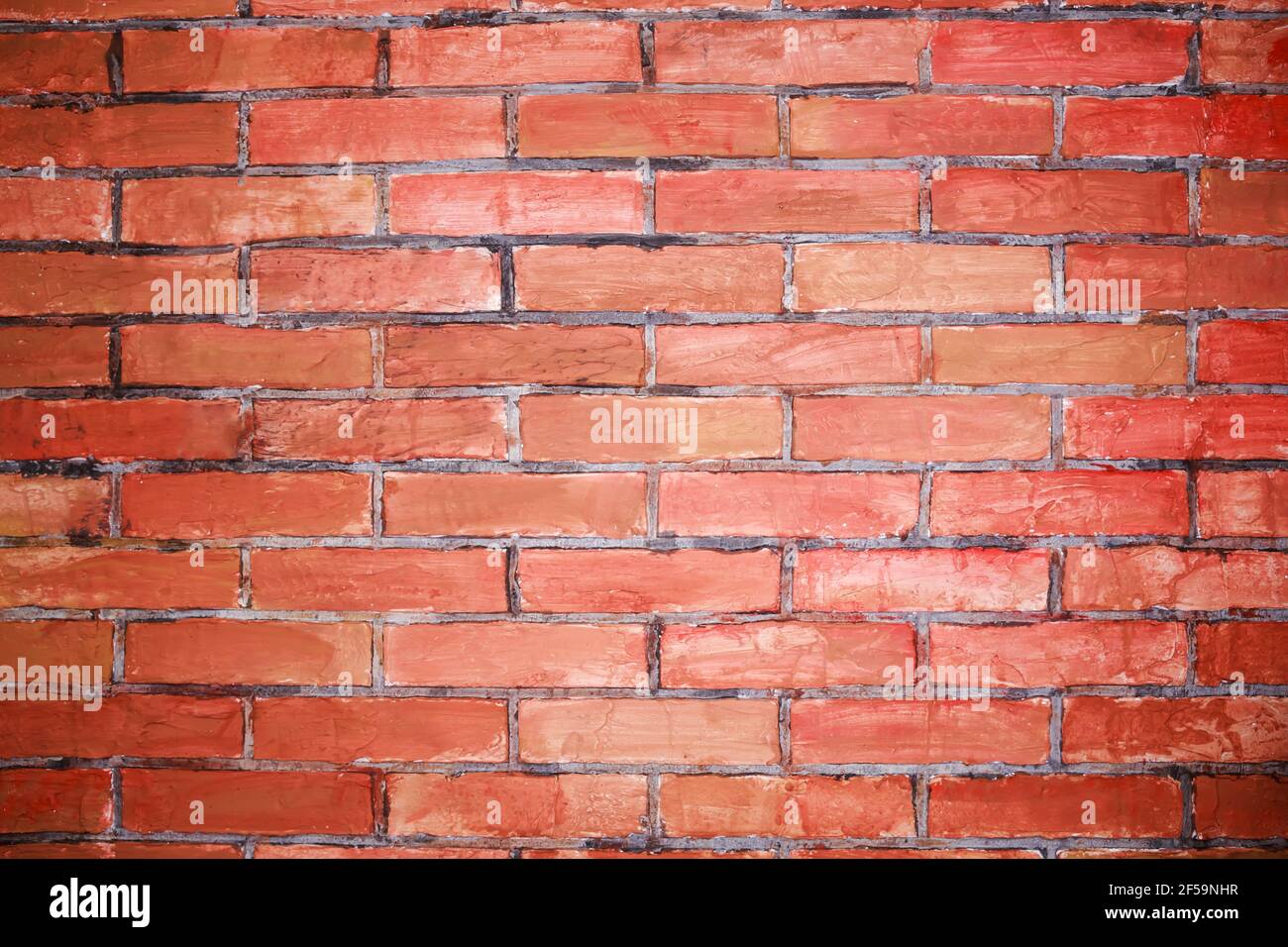 Mur de briques fait à la main fait de briques, texture de fond abstraite Banque D'Images