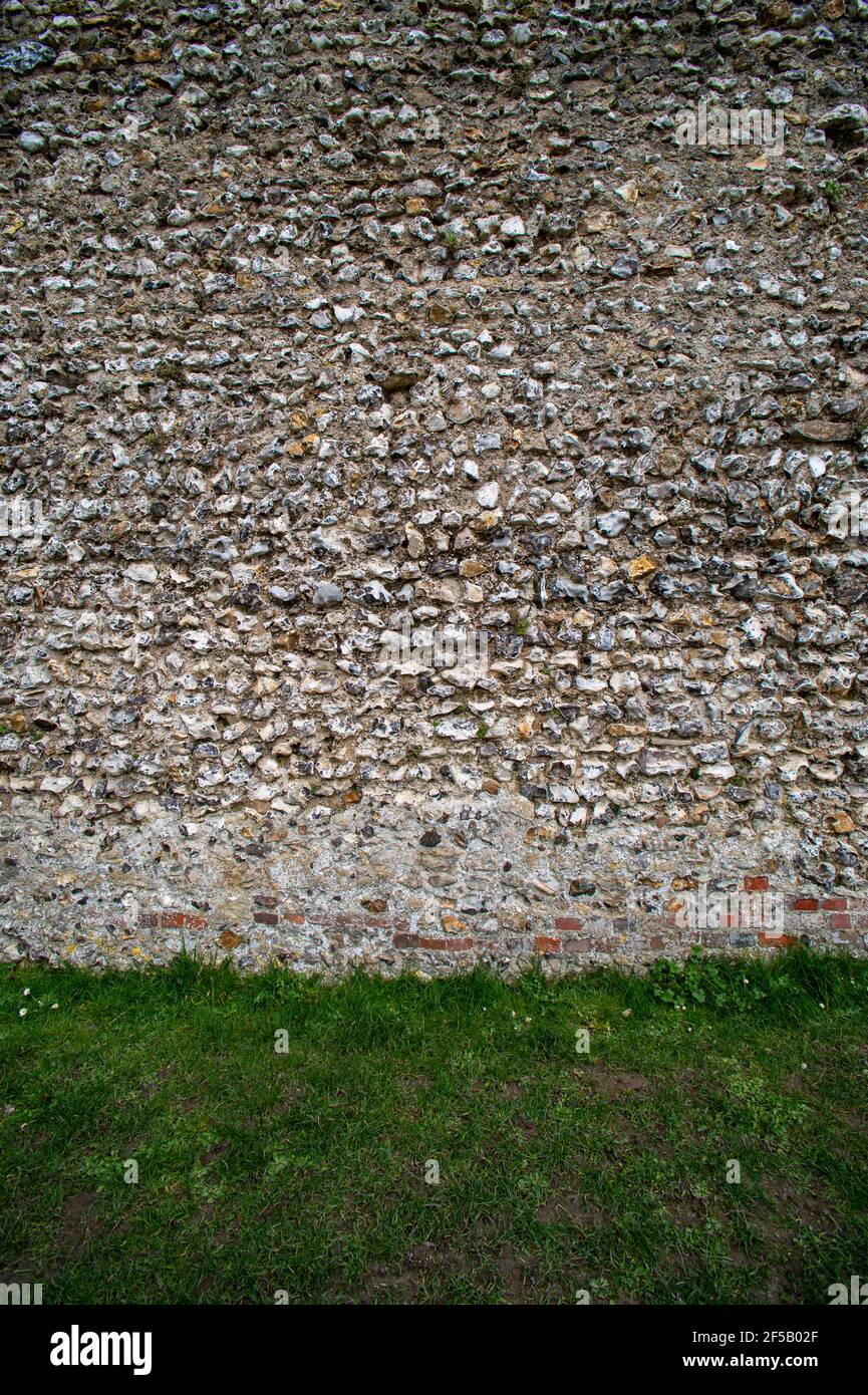 Mur en pierre de Flint. Mur du château. Arrière-plan. Banque D'Images