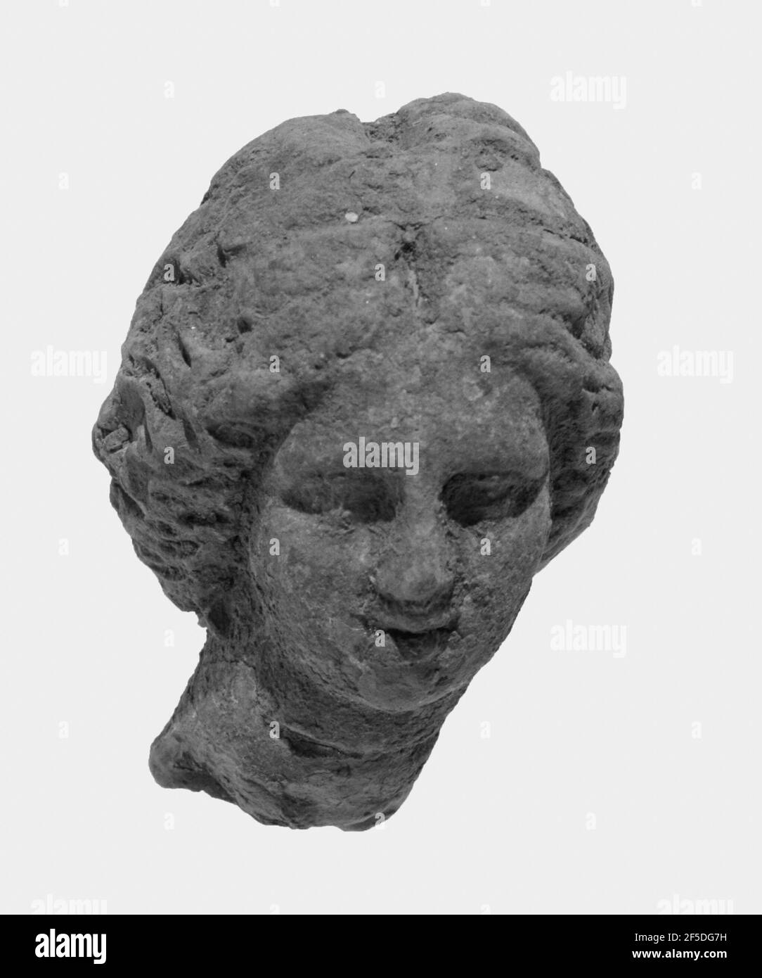 Tête avec coiffure Melon. Inconnu Banque D'Images