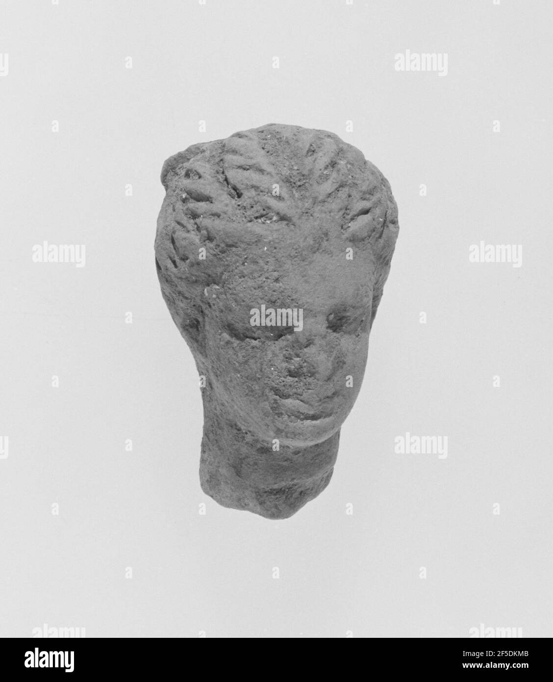 Tête avec coiffure Melon. Inconnu Banque D'Images