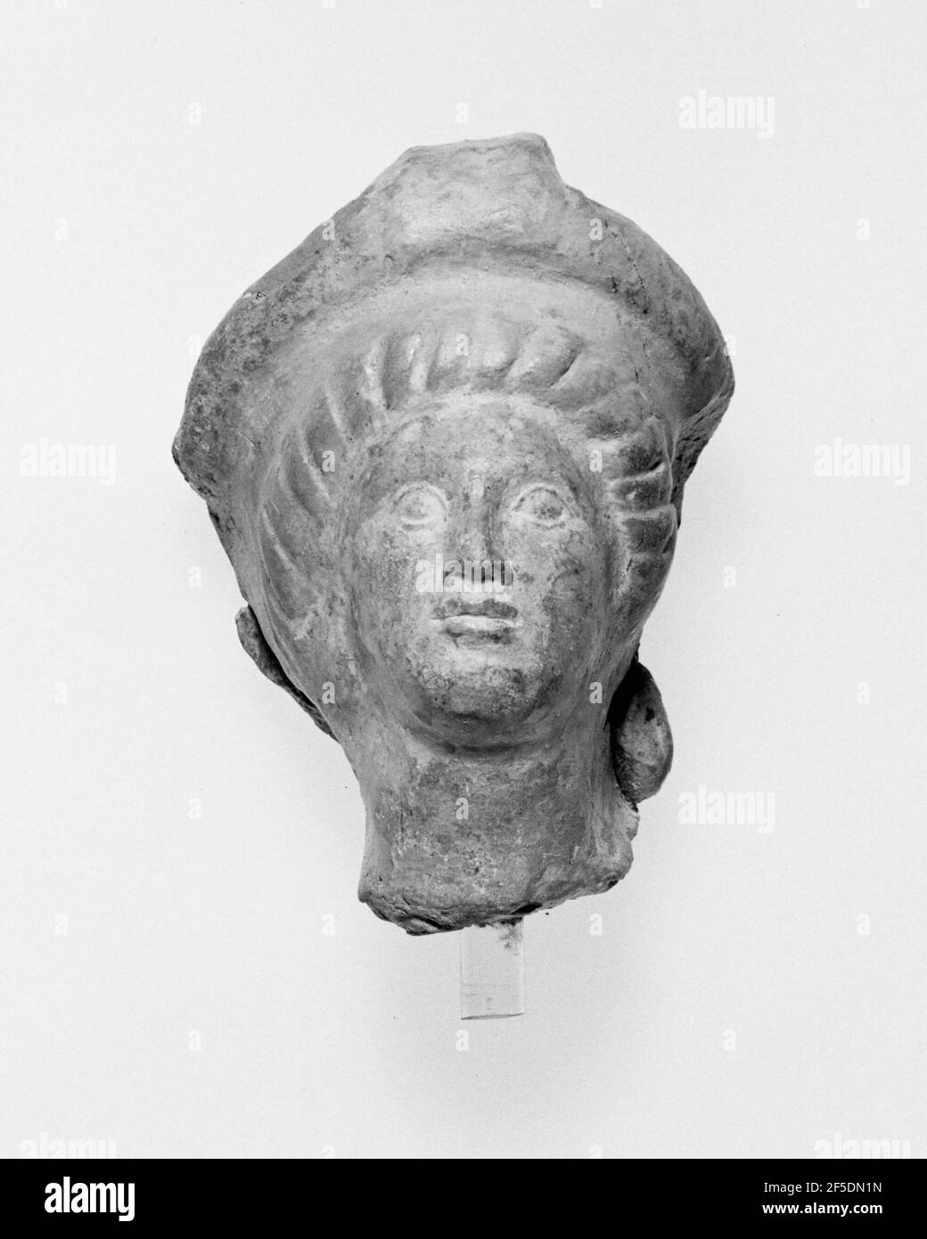 Tête votive. Inconnu Banque D'Images