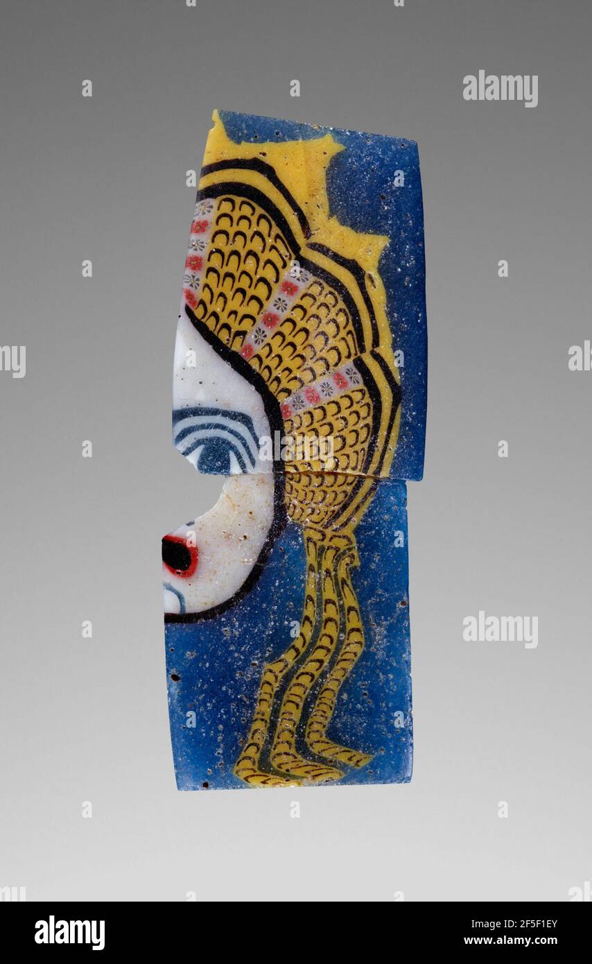 Tranche de canne avec masque de théâtre. Inconnu Banque D'Images