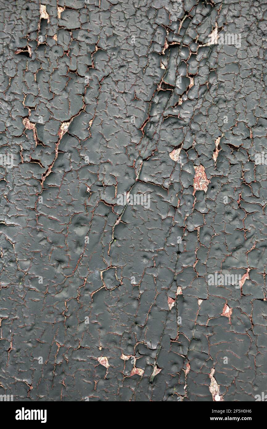 Texture d'arrière-plan de peinture écaillée vert foncé. Porte en bois avec peinture écaillée Banque D'Images Texture d'arrière-plan de peinture écaillée vert foncé. Porte en bois avec peinture écaillée Banque D'Images