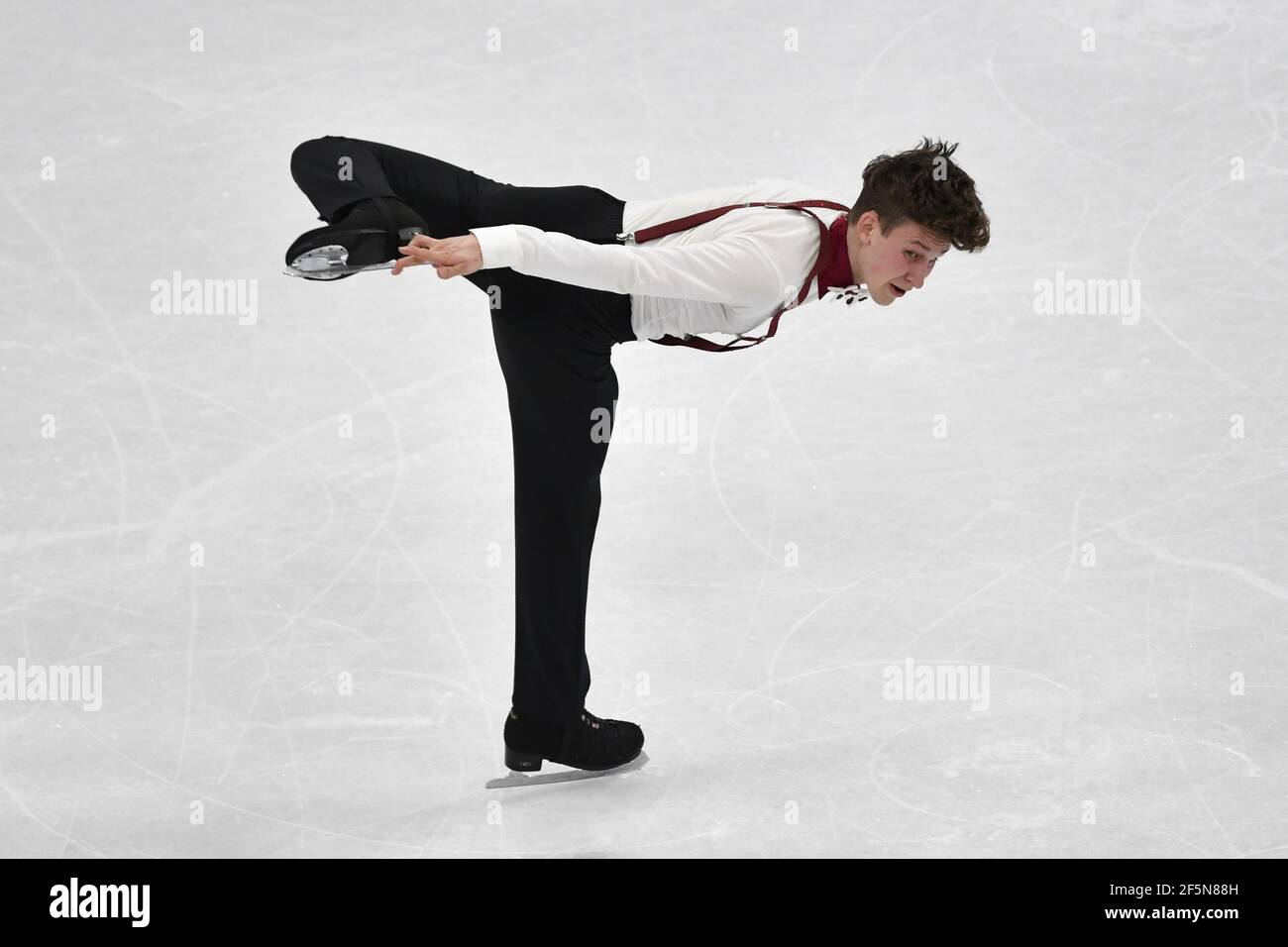 Lukas Britschgi, de Suisse, se produit lors du patinage libre des hommes aux Championnats du monde de patinage artistique de l'UIP à Stockholm, Suède, le 27 mars 2021. Photo Jessica Gow / TT Kod 10070 Banque D'Images