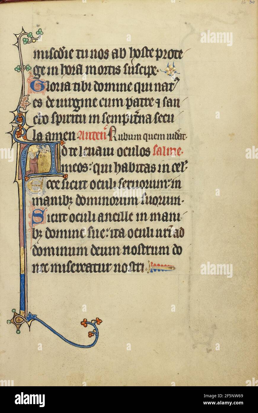 Initiale A : une femme à genoux priant au Christ. Inconnu Banque D'Images