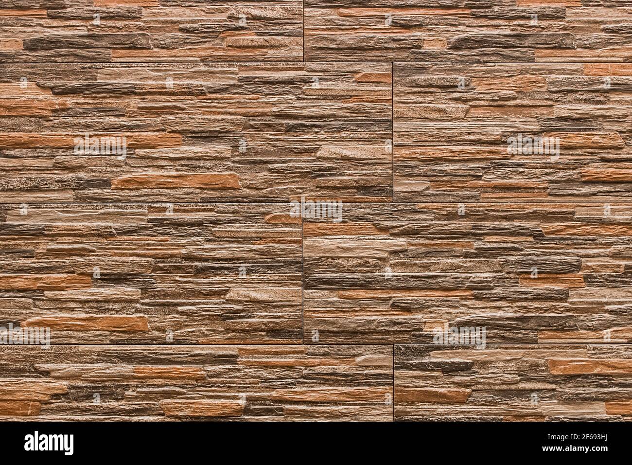 Mur moderne décoratif en pierre avec fond de texture à motif abstrait. Banque D'Images