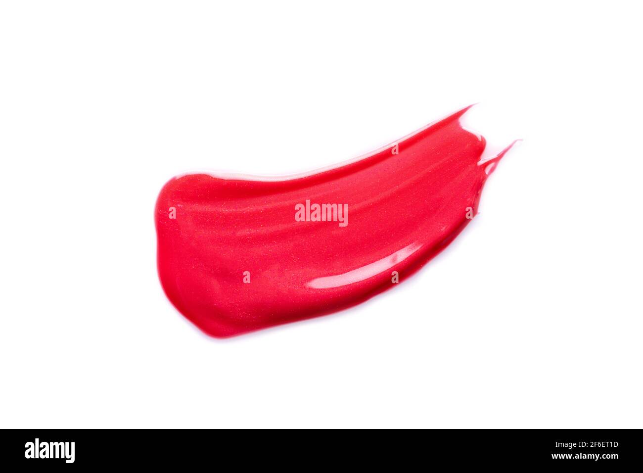 Frottis rouge de rouge à lèvres isolé sur blanc. Banque D'Images