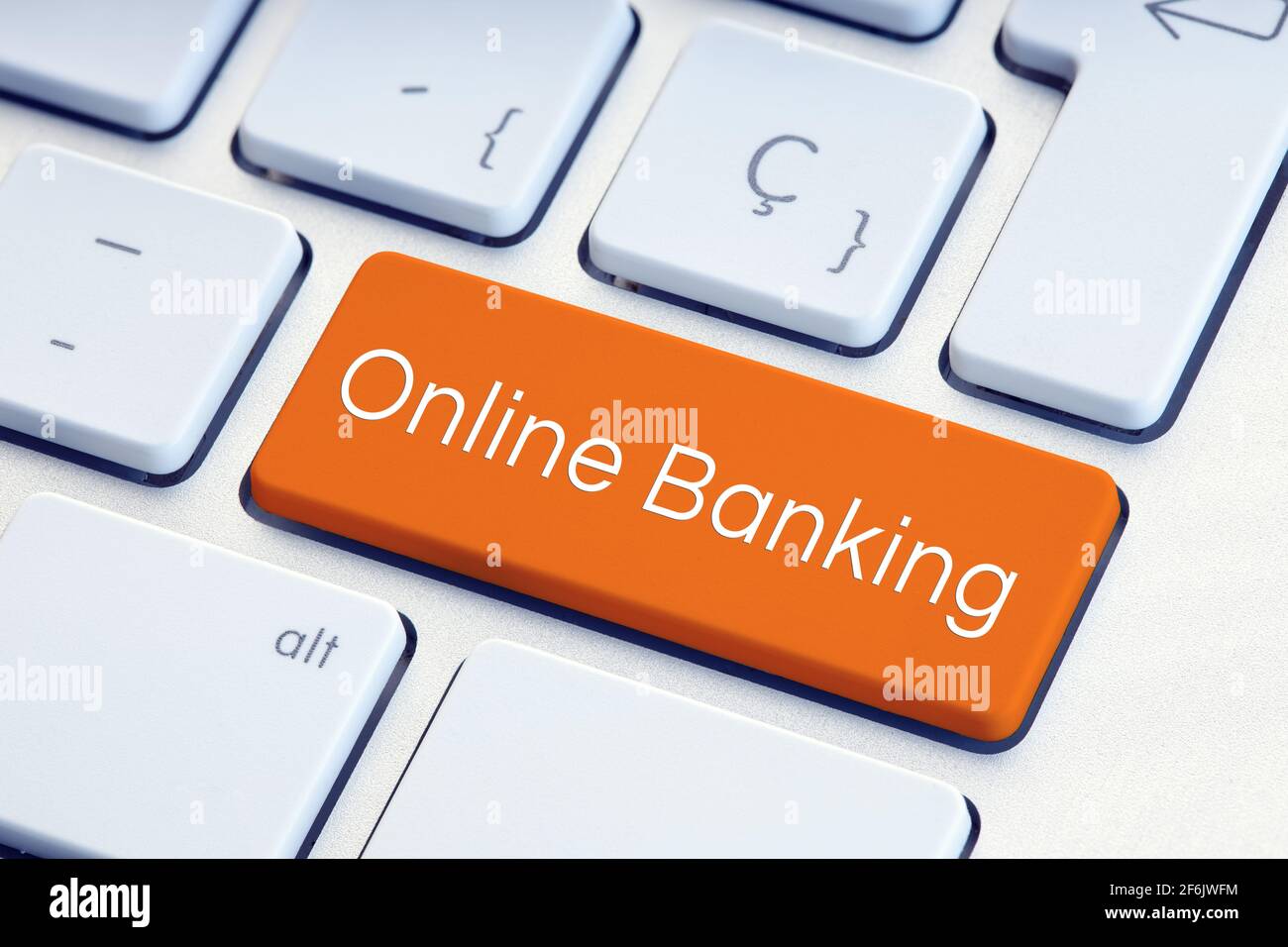Mot bancaire en ligne sur la touche de clavier d'ordinateur de couleur orange Banque D'Images