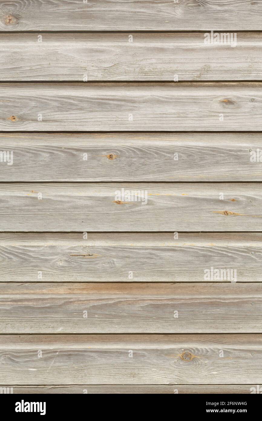 Panneaux en bois ou panneaux en similibentre, parement en bois sur un ancien bâtiment extérieur, Royaume-Uni. Texture de bois de chêne abîmé Banque D'Images