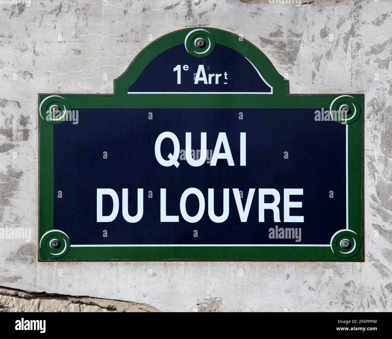 Plaque de rue quai du Louvre à Paris France Banque D'Images