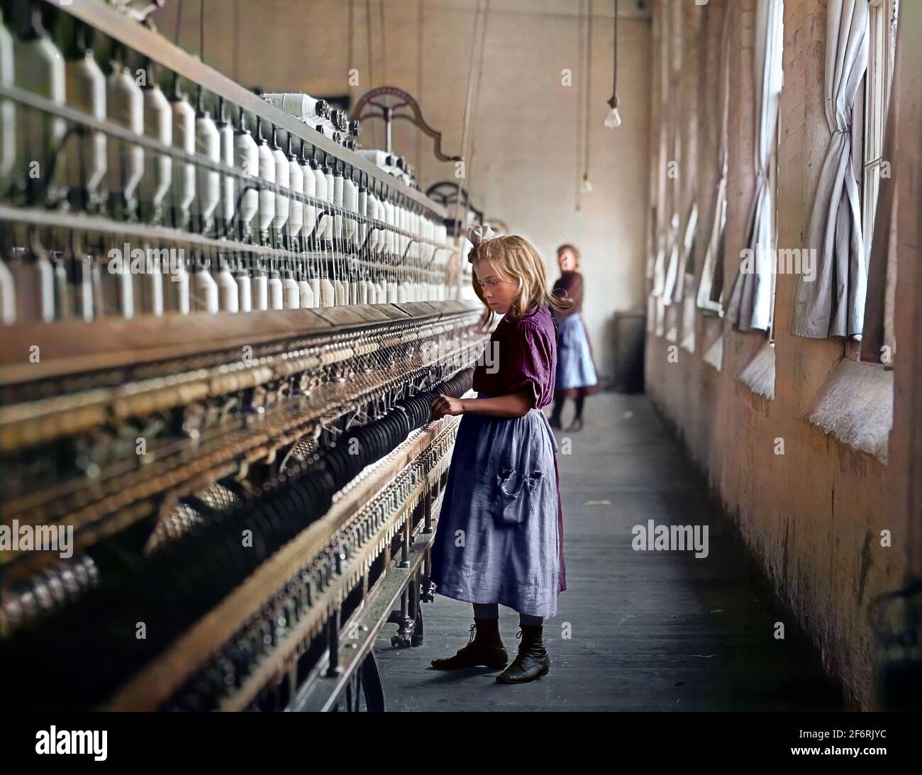 Coton moulin fille Banque D'Images