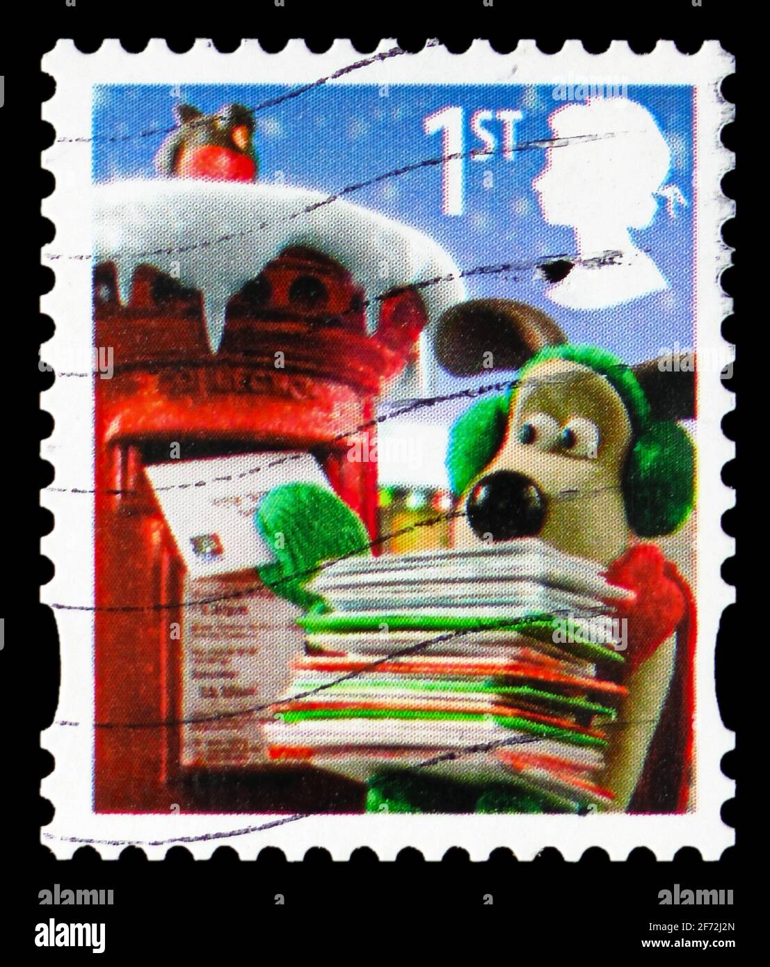 MOSCOU, RUSSIE - 22 DÉCEMBRE 2020 : le timbre-poste imprimé au Royaume-Uni montre les cartes de Noël de Gromit, Wallace et la série de Gromit, vers 2010 Banque D'Images