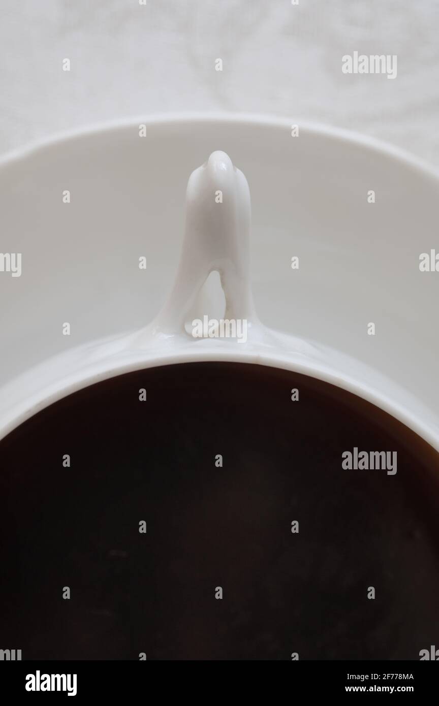 Gros plan sur la poignée de la tasse à café Banque D'Images