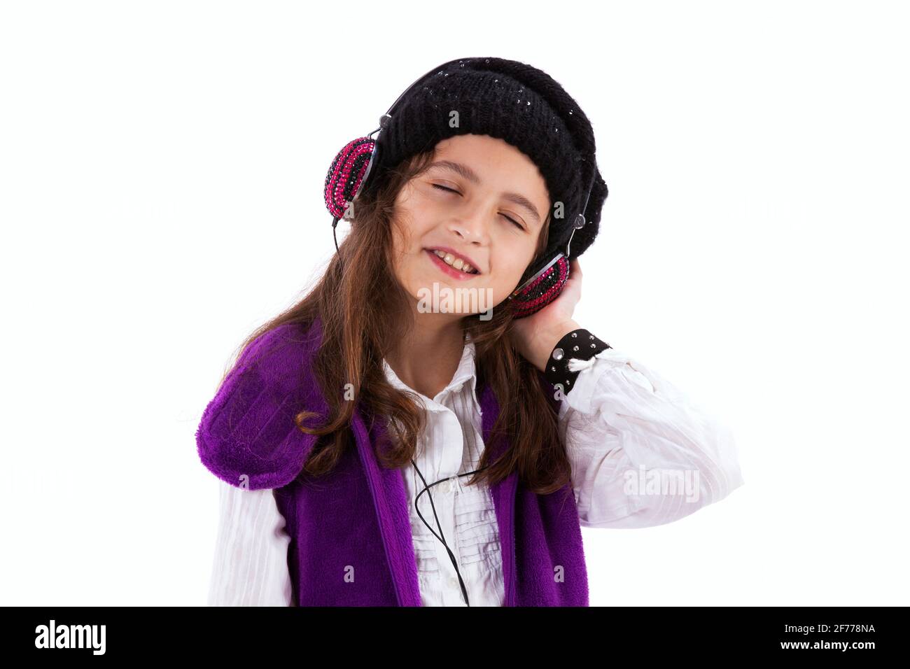 Petite fille écouter de la musique Banque D'Images