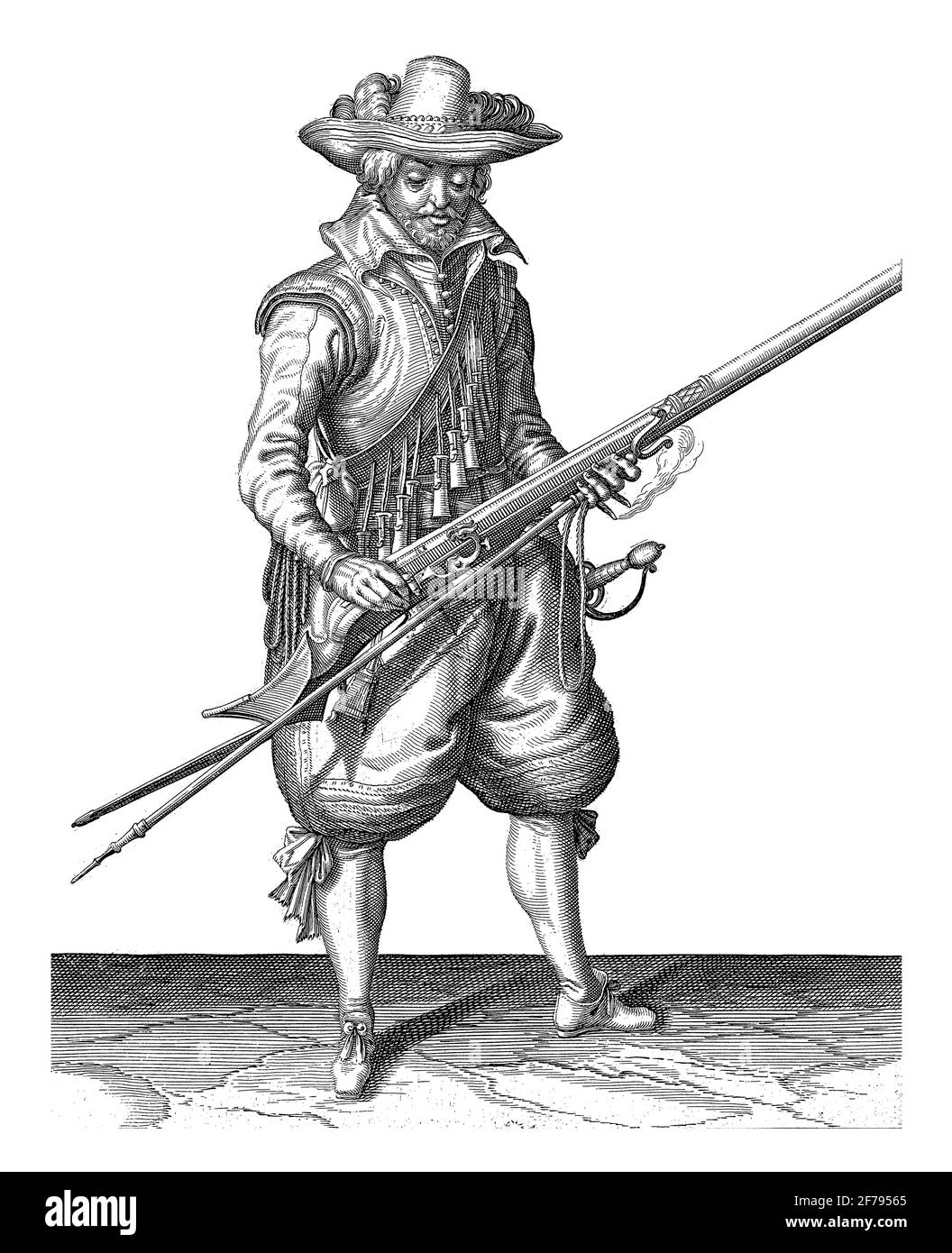 Un soldat, de pleine longueur, à droite, qui secoue un mousquet (un certain type d'arme à feu) avec les deux mains, pour enlever toute poudre qui est tombée à l'extérieur de la TH Banque D'Images