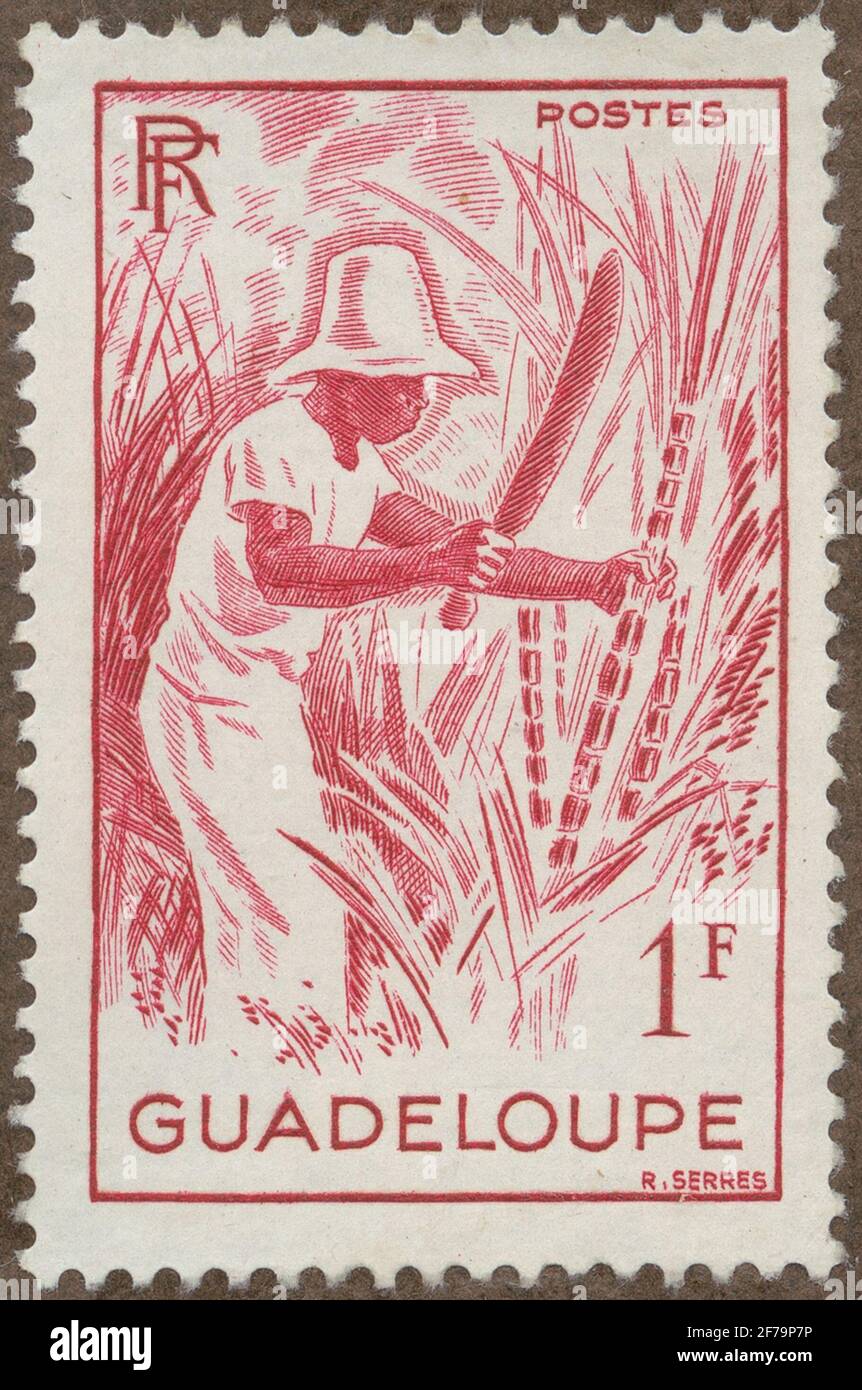 Timbre de la cession de la philatéliste de Gösta Bodman, commencé 1950.le timbre de la Guadeloupe, 1947. Motifs de la récolte de sokerrör. Banque D'Images