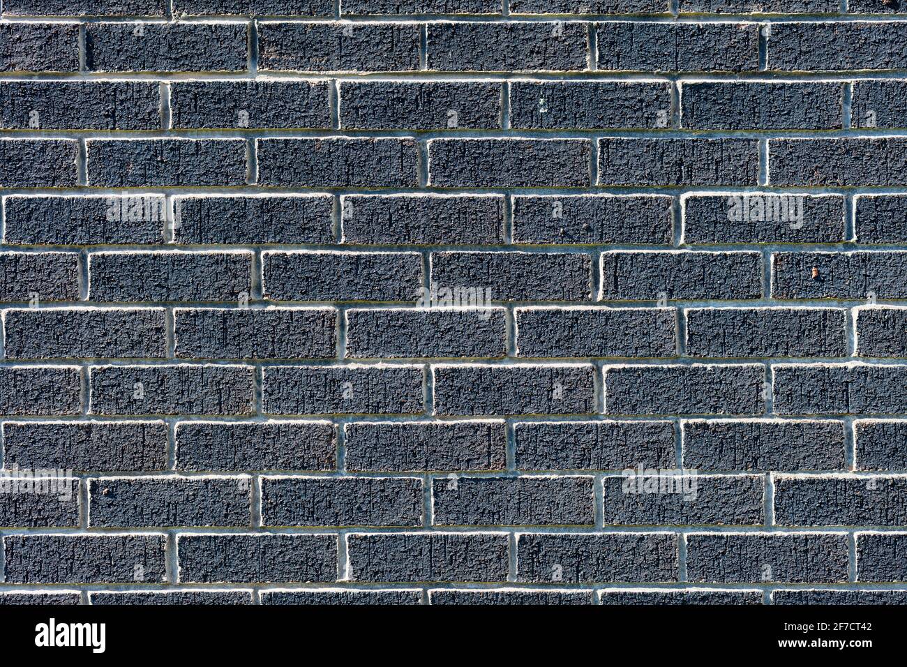 Fond de mur de brique noire variété de briques mur de brique fait Avec de nouvelles briques de maison régulières photo haute résolution de haute qualité Banque D'Images