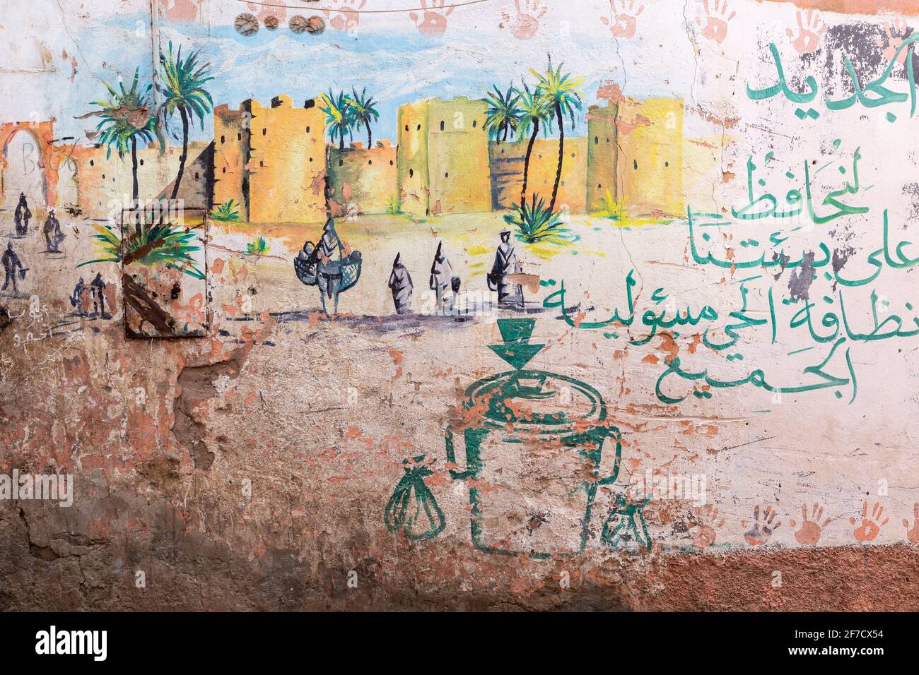 Peinture sur un mur dans la médina de Marrakech, Maroc Banque D'Images