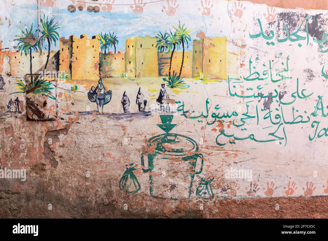 Peinture sur un mur dans la médina de Marrakech, Maroc Banque D'Images