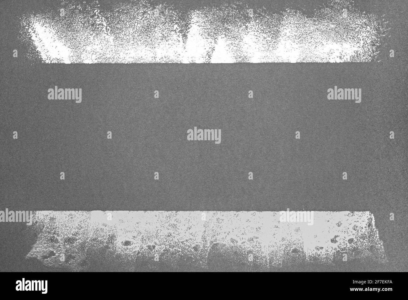 rouleaux de peinture acrylique sur papier gris. arrière-plan de peinture abstrait Banque D'Images