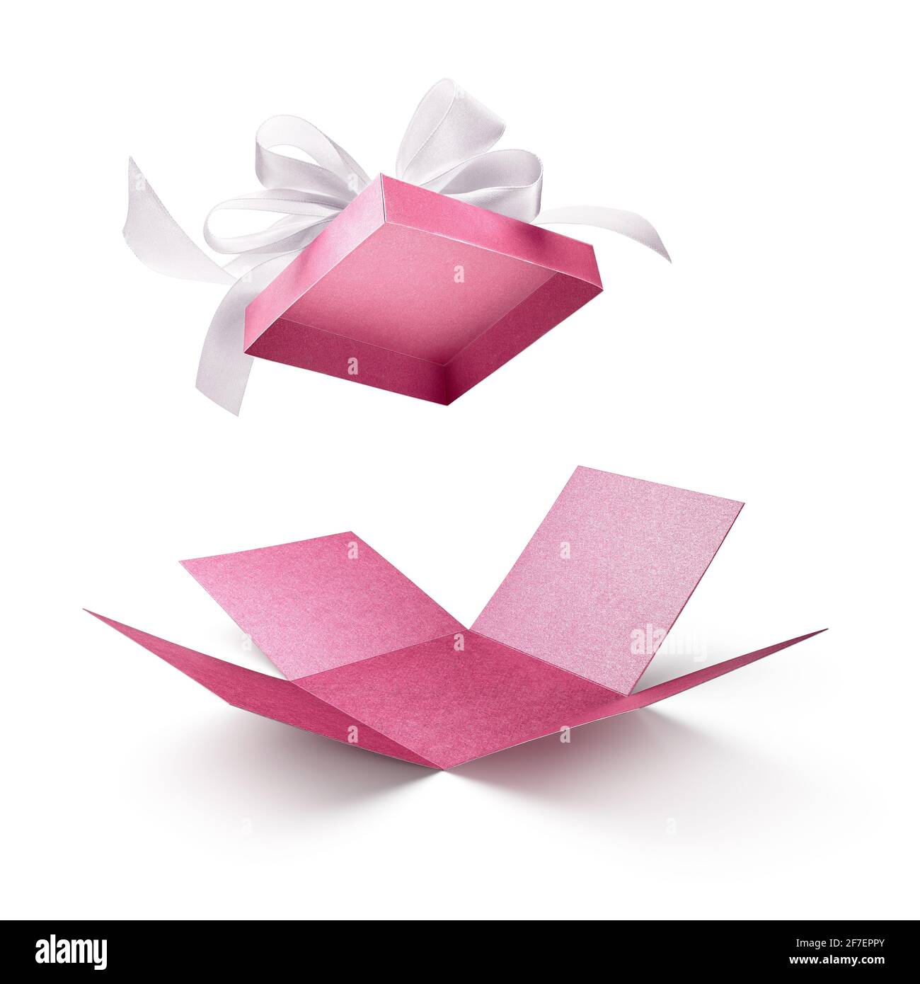 Boîte cadeau surprise, boîte cadeau ouverte de couleur rose avec noeud  blanc isolé sur blanc Photo Stock - Alamy