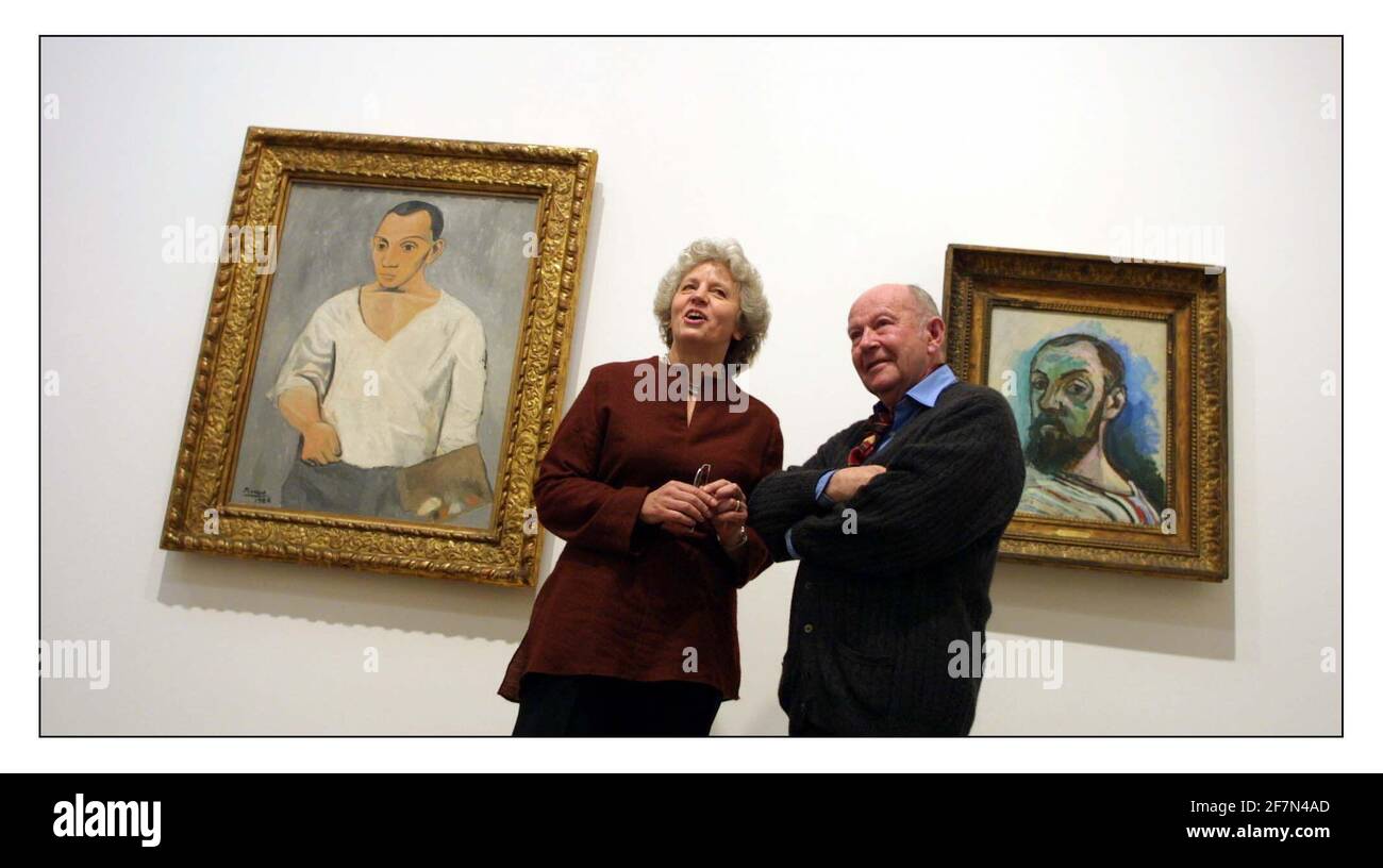 Matisse et Picasso......au Tate Modern du 11 mai au 18 août 2002... Les conservateurs de l'exposition Elizabeth Cowling et John Golding avec autoportraits des deux artistes arpentent l'exposition.pic David Sandison 6/5/2002 Banque D'Images