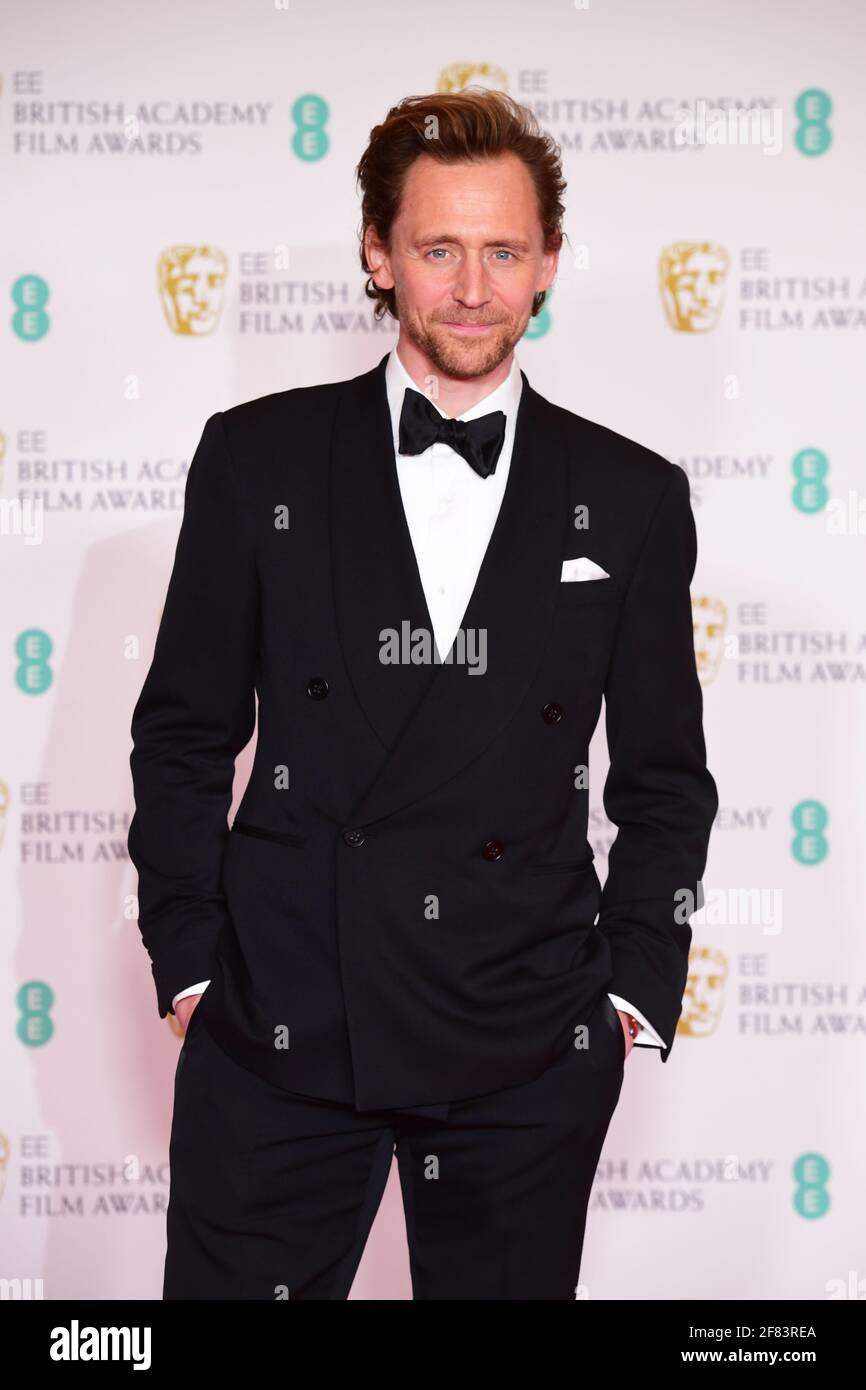 Tom Hiddleston arrive pour les prix du film EE BAFTA au Royal Albert Hall de Londres. Date de la photo: Dimanche 11 avril 2021. Banque D'Images