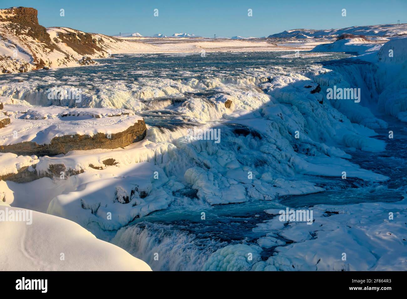 La cascade est considérée par beaucoup comme l'une des plus belles chutes d'eau d'Islande. En hiver, la vue est spectaculaire lorsque la cascade gèle Banque D'Images