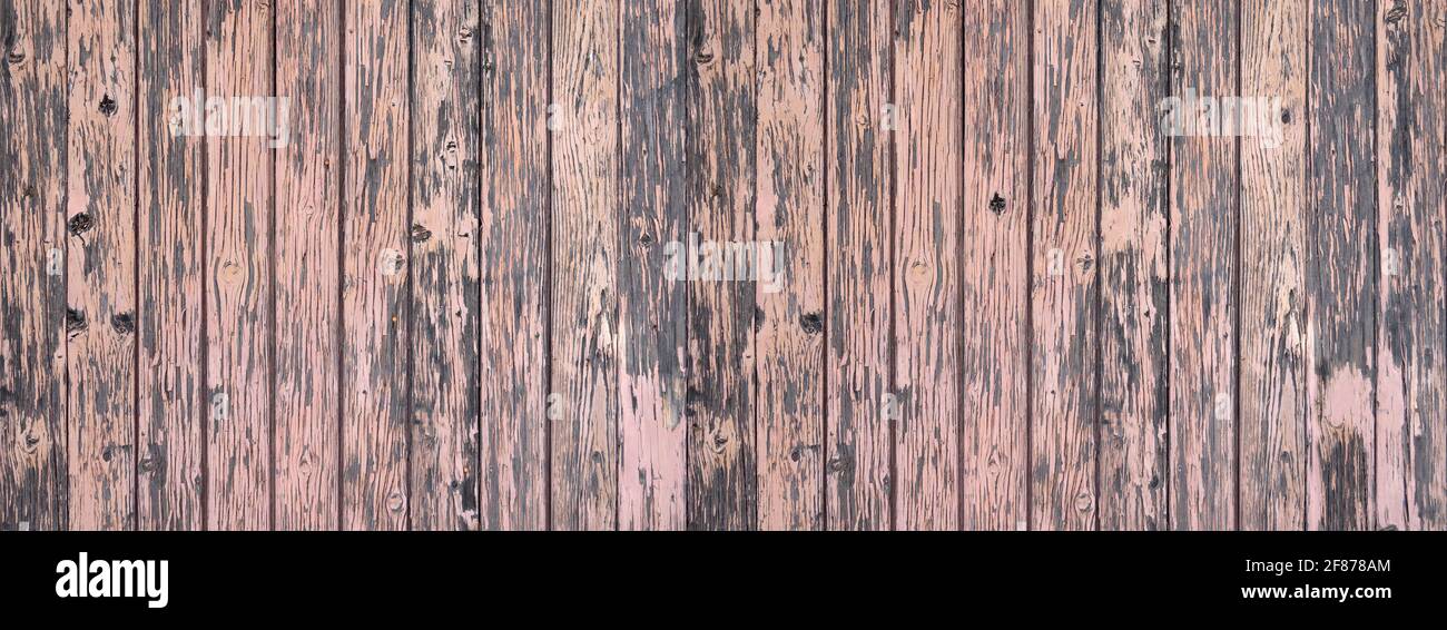 Vieux mur en bois très abîmé, rose et gris Banque D'Images