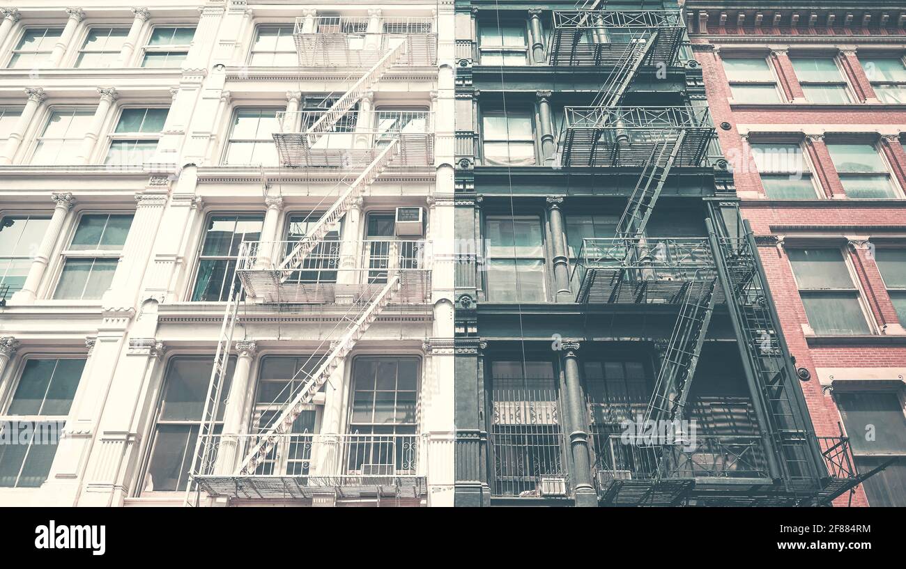 Vieux bâtiments avec des évasions de feu de fer, couleurs appliquées, New York City, Etats-Unis. Banque D'Images