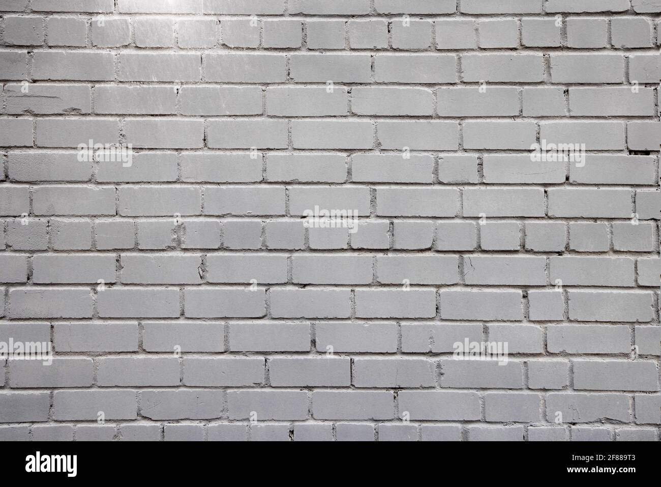 Arrière-plan industriel, vide grunge mur de briques d'entrepôt urbain. Arrière-plan en briques peintes en milieu urbain Banque D'Images