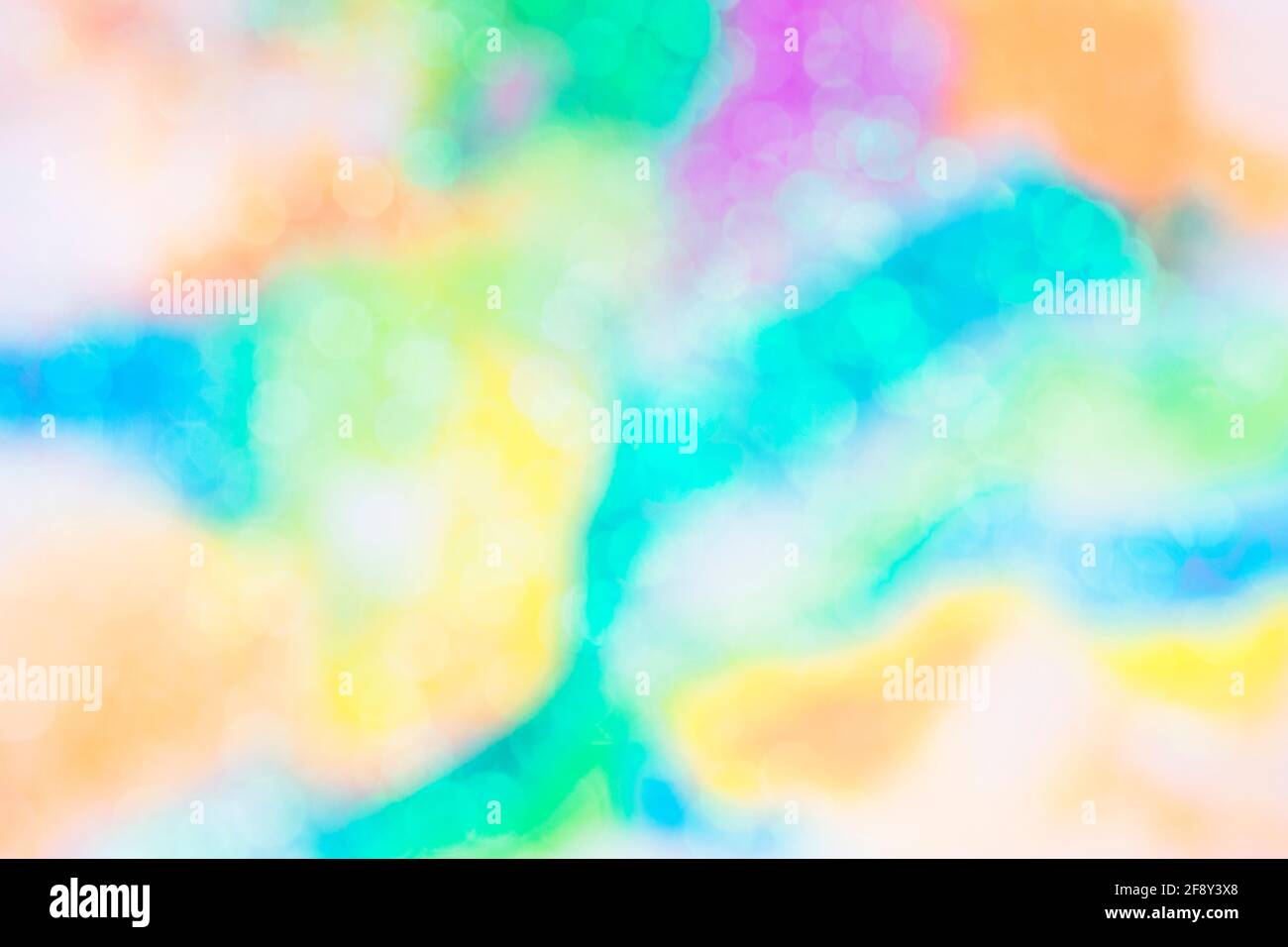 Lumières bokeh colorées. Arrière-plan arc-en-ciel brillant flou . Banque D'Images