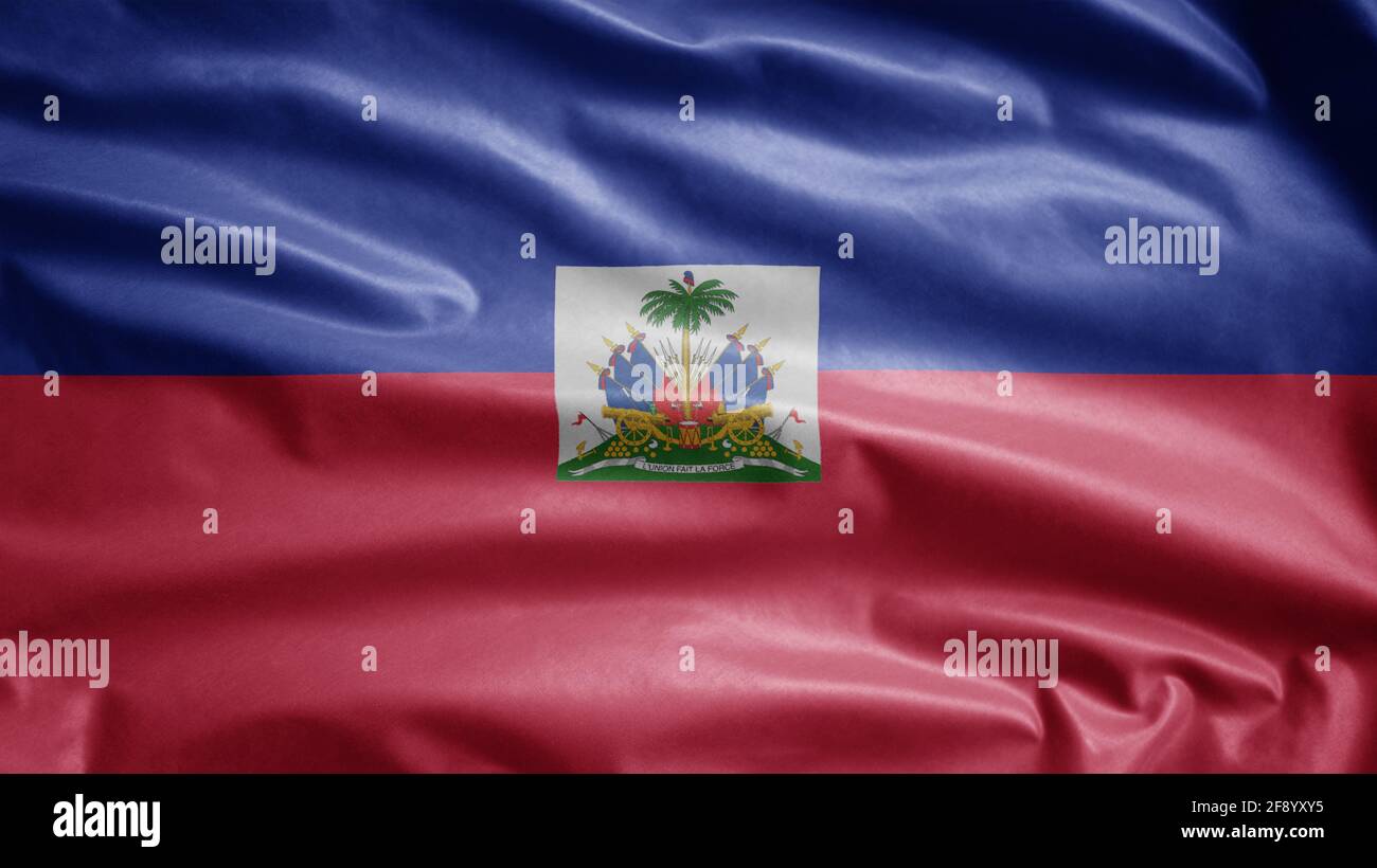 Drapeau haïtien agitant dans le vent. Gros plan de la bannière d'Haïti soufflant, doux et lisse soie. Tissu texture ensign arrière-plan. Banque D'Images