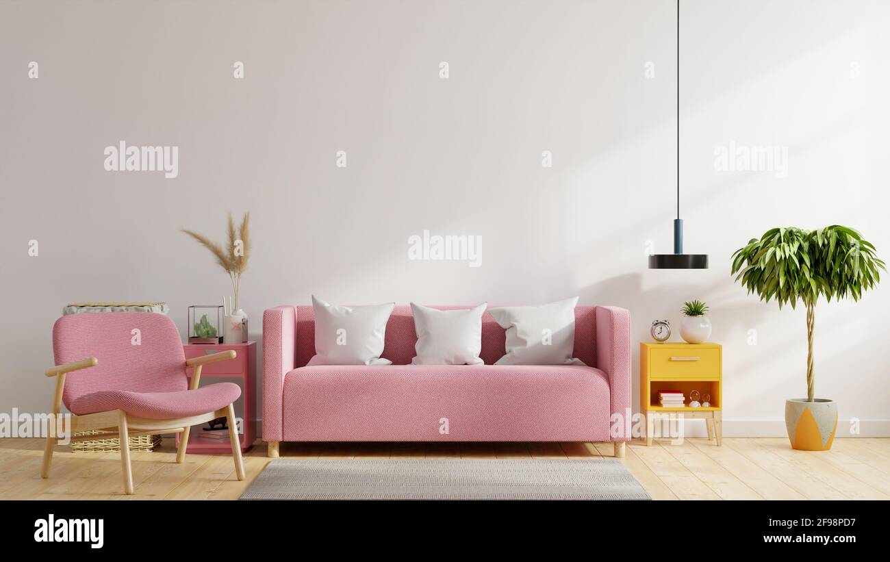 Lumineux et confortable, l'intérieur moderne du salon est doté d'un canapé rose, d'un fauteuil Et lampe avec fond de mur blanc.rendu 3D Banque D'Images