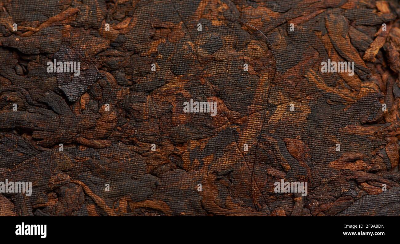 Texture chinoise de thé noir comme fond. Banque D'Images