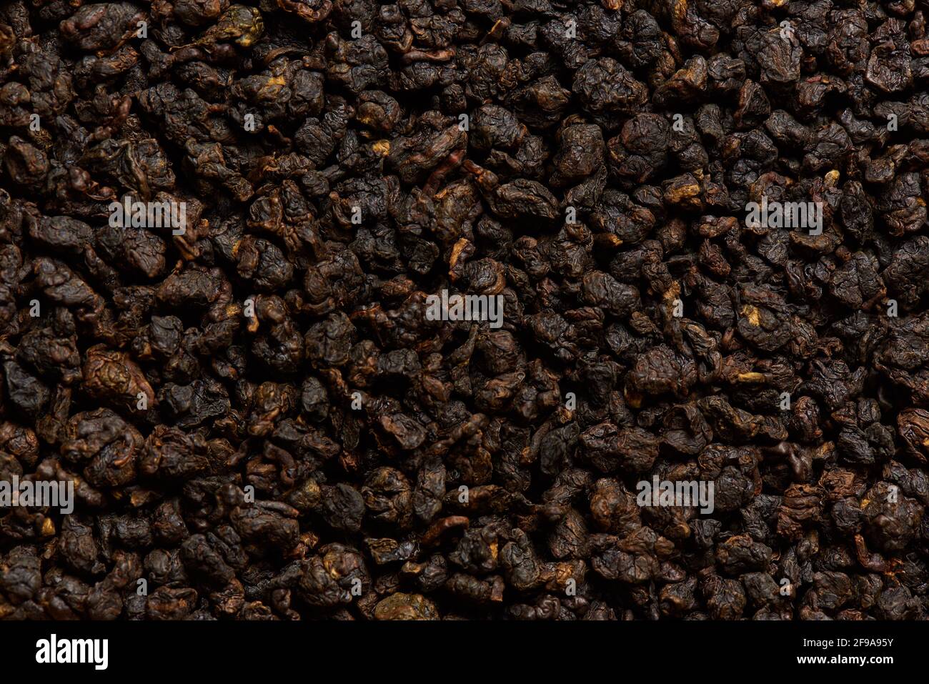 Photo macro des feuilles de thé biologique comme arrière-plan. Banque D'Images