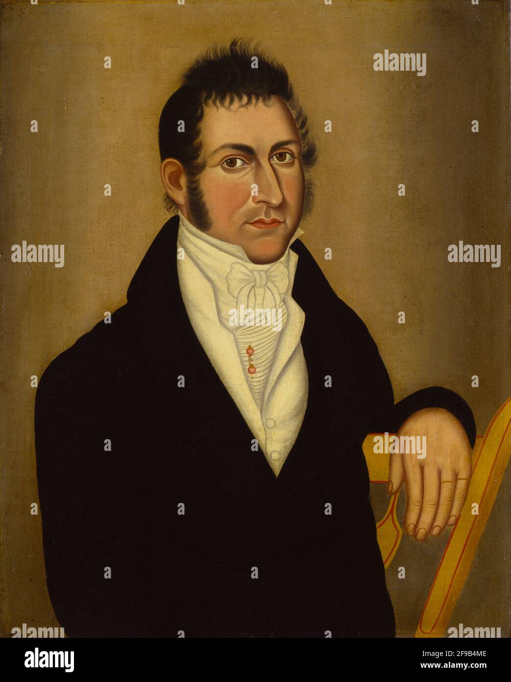 Homme en chaise jaune, ca. 1820. Banque D'Images