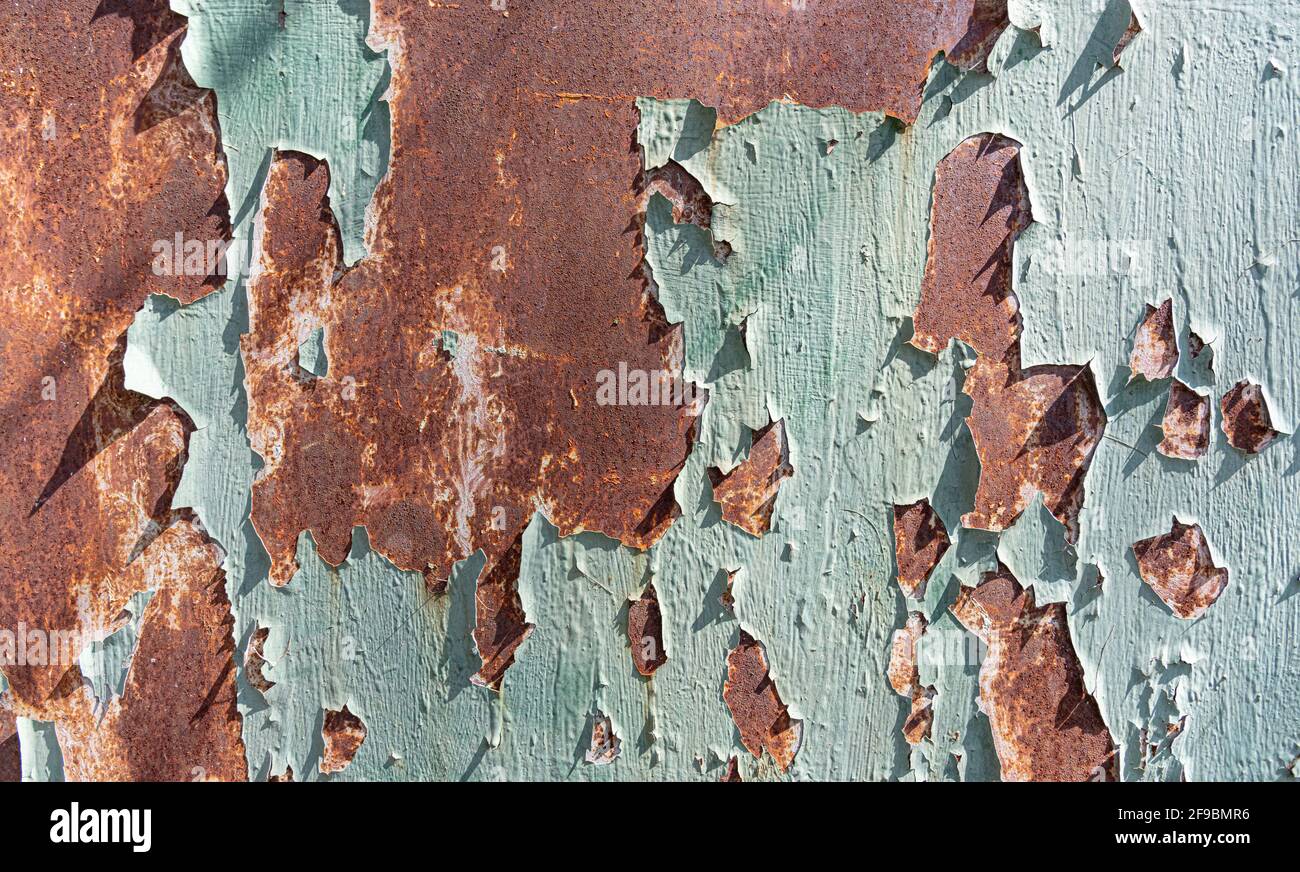 Texture de vieux métal rouillé avec peinture écaillée comme arrière-plan abstrait. Banque D'Images